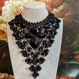 Black color lace necklace.